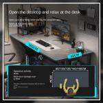 A modern gaming desk setup featuring a sleek, gray desk with a curved black frame. The desk holds a monitor displaying a mountain landscape, a keyboard, a mouse, and various accessories. A gaming PC with blue LED lights is positioned underneath. The wall has a pegboard with a digital clock and other items.